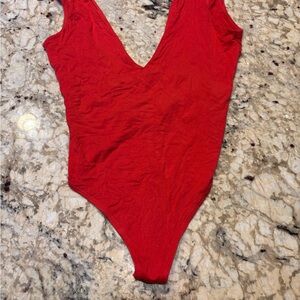 Red deep V-neck Urban Outfitters body suit